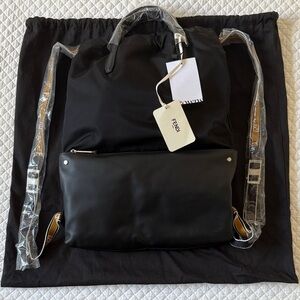 NWT Fendi Black Leather and Nylon Drawstring Backpack with Front Zipper Pocket